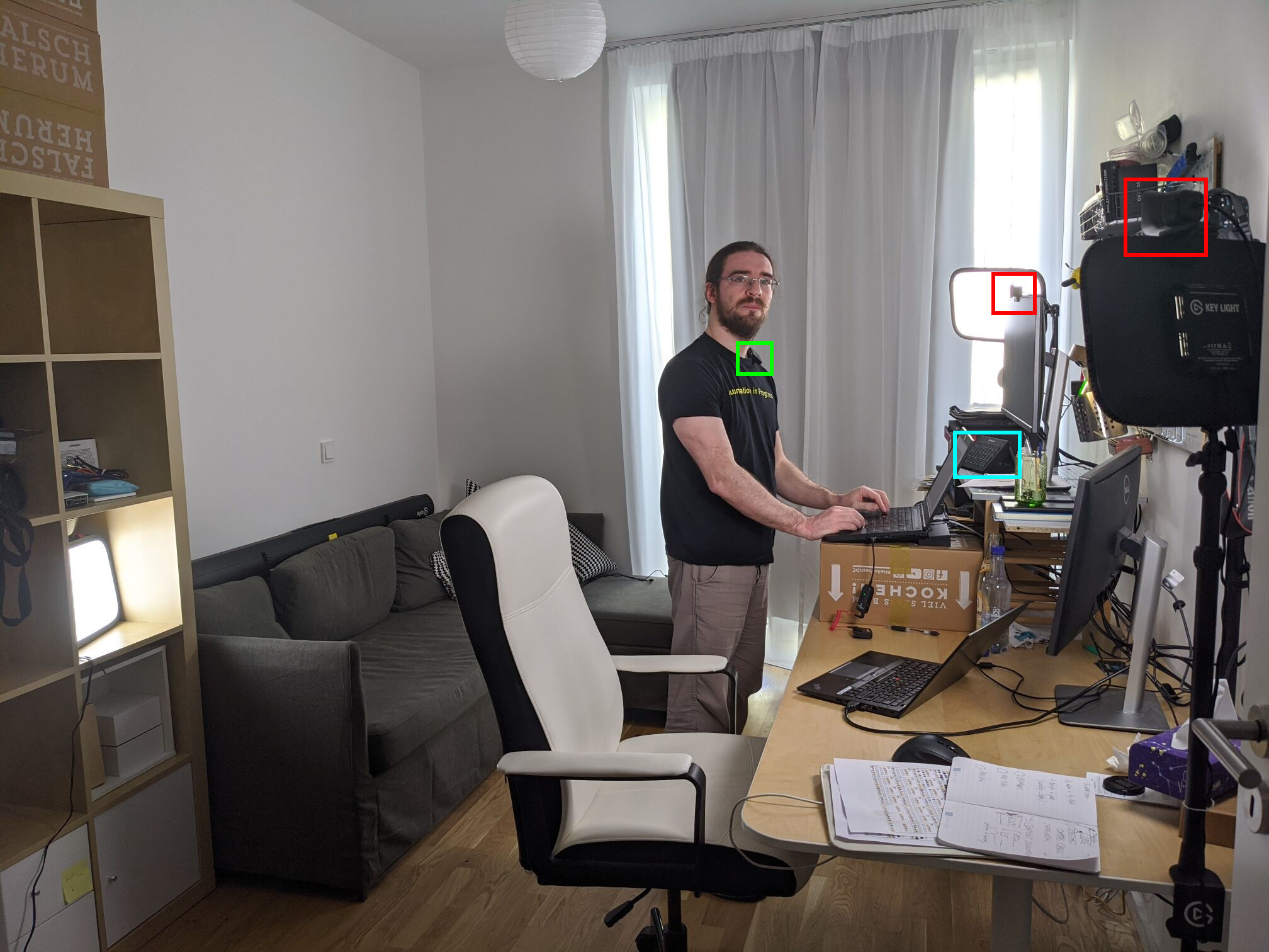 Wide angle picture of my desk with both laptops, lights, cameras,
etc.